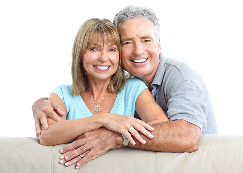 Senior Happy Couple With Dental Implants From Big Heart Family Dentistry